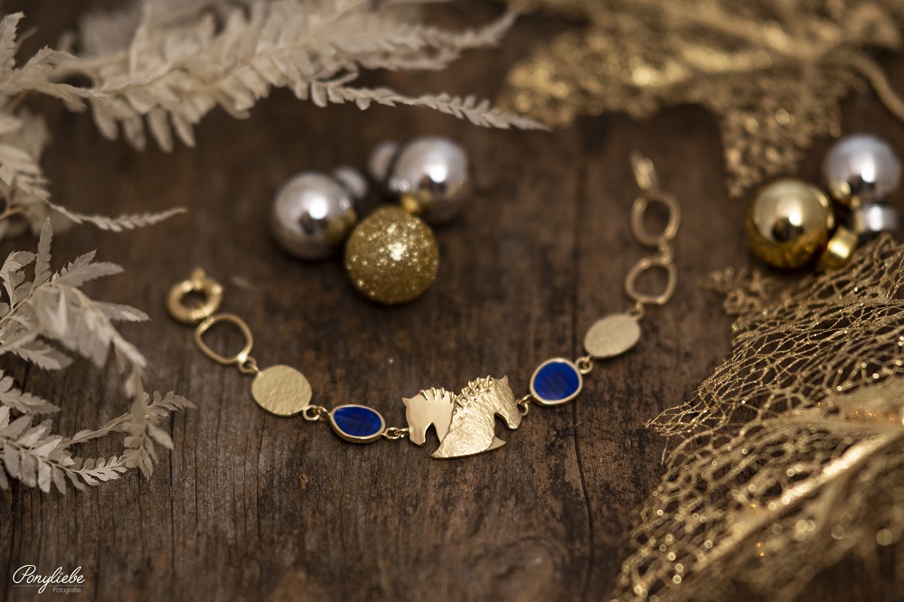 Armband by Runedal, gold mit blauen Zirkonia